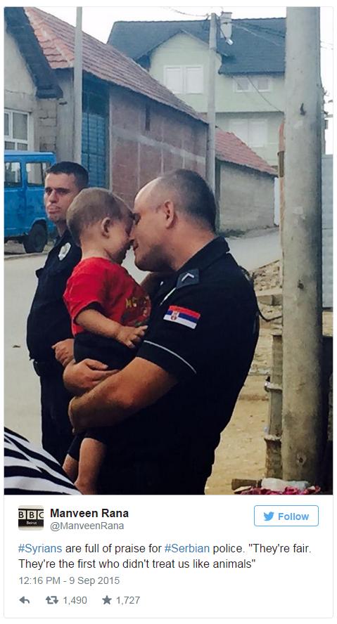 picture of policeman hugging boy