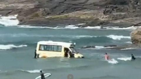 Ice cream van caught in rising tide