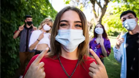 Getty Images Woman with mask