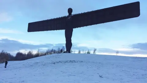 PA A very snowy Angel of the North