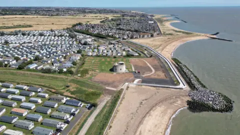 Environment Agency Image of sea and homes and businesses on the coastline