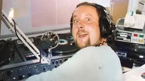 John Randall John Randall in the radio studio of Offshore Radio in 1988.