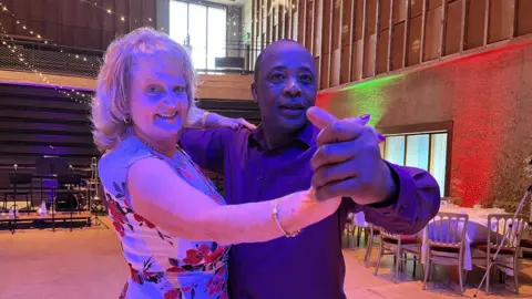 Jon Wright/BBC Professional dancers Karen Robinson and Donald Simba Mlambo