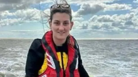 Karen Cox/RNLI Becky Cannon on a lifeboat at sea