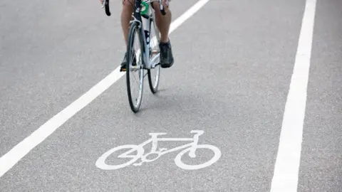 Getty Images Bike riding on bike path