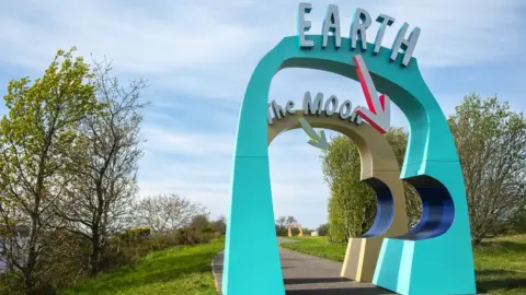 Nerve Centre Earth and moon scultpures in our place in space trail in derry