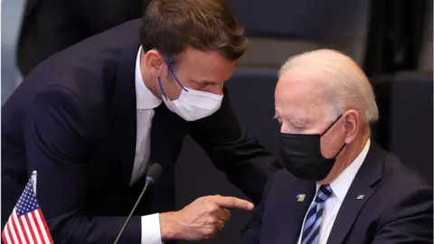 Getty Images Macron and Biden at Nato summit