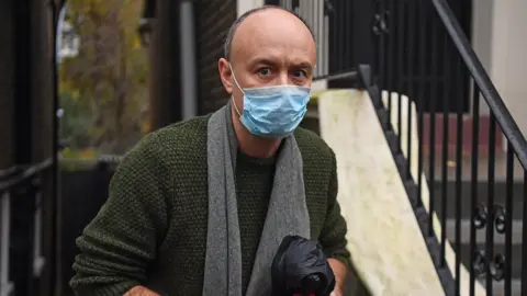 PA Media Dominic Cummings outside his home on Saturday