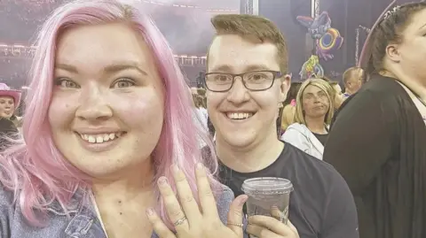 Joshua Phillips Josh and Ella with the engagement ring at the Pink concert