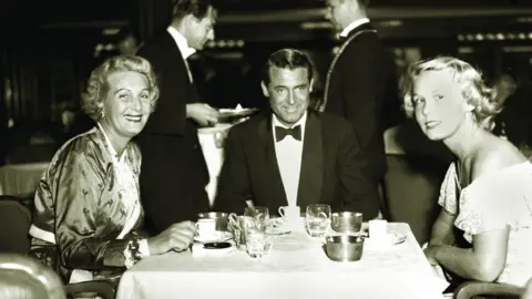 PA Media Cary Grant on board the Queen Mary