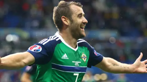 Niall McGinn celebrates scoring for Northern Ireland against Ukraine at Euro 2016