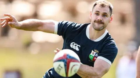 Tomos Williams passing the ball in British and Irish Lions training