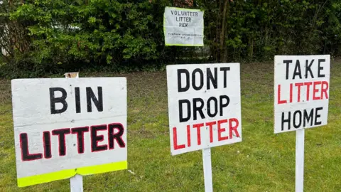 Signs put up temporarily by litter pickers in the Cwmbran area