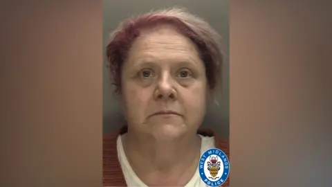 West Midlands Police Deborah Latewood has short pink hair in her mug shot