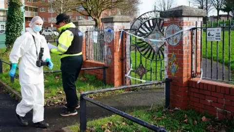 Scenes of crime officers at a stabbing in Rawnsley Park in Bristol