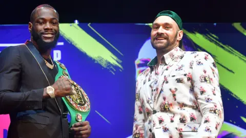 Tyson Fury (right) and Deontay Wilder