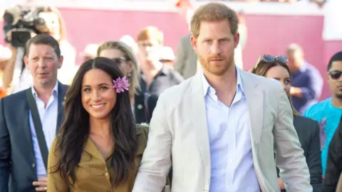 Getty Images Harry and Meghan on tour in South Africa