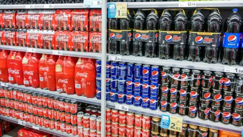 Getty Images Coca-Cola and Pepsi bottles and cans