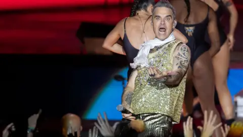 Robbie Williams performs onstage during his concert at the Marenostrum in Fuengirola, Malaga, Spain, 15 June 2023.