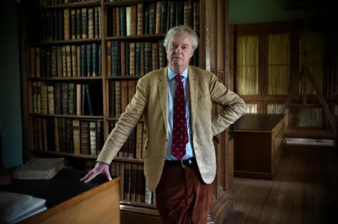 Alamy Christopher de Hamel in the Parker Library in 2016
