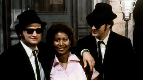 Getty Images Aretha Franklin with John Belushi and Dan Aykroyd on the set of The Blues Brothers