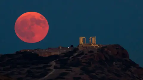 Supermoon seen over the Temple of Poseidon