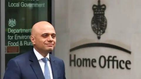 PA Sajid Javid outside the Home Office