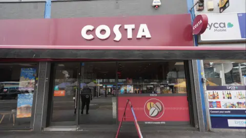 PA The Costa Coffee branch on Station Parade in Barking, east London