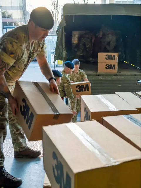 PA Media Soldiers deliver protective equipment to doctors and nurses working at St Thomas' Hospital in London