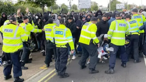 BBC Police face protestors in Melton Road