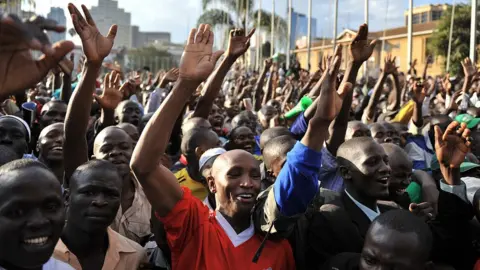 AFP Kenyans celebrating the adoption of the new constitution in 2010