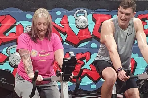 Brain Tumour Research Linda Peel with Josh Burniston