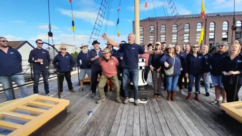 Lymouth Sailing Club Lynmouth Shanty Crew on the SS Britannia at Bristol Shanty Festival 2023