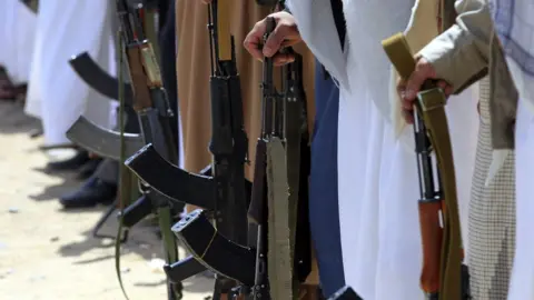 EPA Supporters of Yemen's rebel Houthi movement attend a rally in Sanaa (12 September 2018)