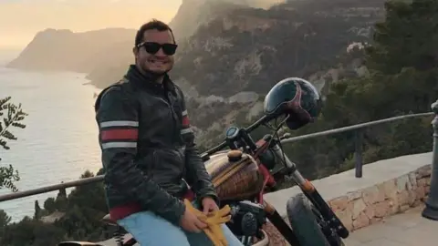 Mark Garland A man on a motorbike