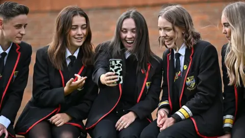 Getty Images Lochgelly High School pupils Mason Smith, Beth Adam, Katie Wilson, Charlotte Alexander and Katie Brennan with their results