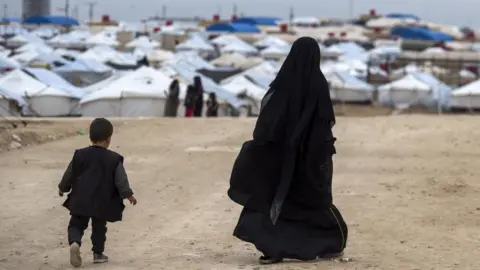 Getty Images Displaced people in Al-Hawl camp in north-eastern Syria