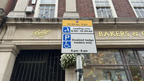 BBC New parking sign outside Betty's tearoom