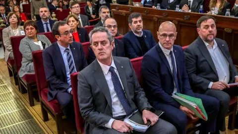 Getty Images The 12 former Catalan separatist leaders at trial in Madrid