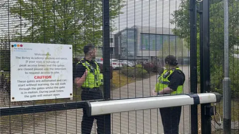 BBC / Simon Thake Police officers at Birley Academy
