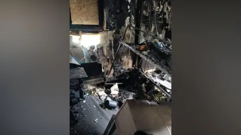 Handout A room burnt out by a fire.