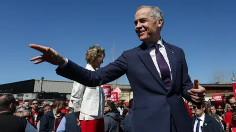 Getty Images Mark Carney at a campaign rally, 2025