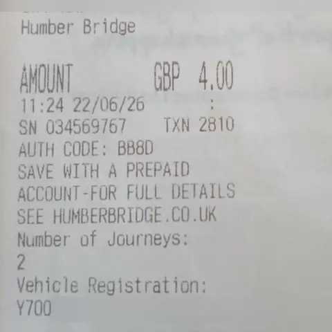 Tony Hughes Picture of a black and white receipt from the PayPoint used. At the very bottom of the receipt the registration can be seen and how it was inputted.