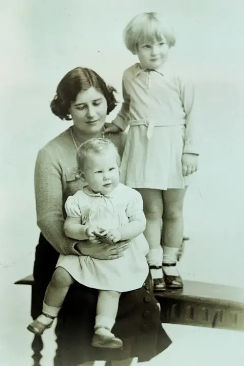 Leonard Chettle Mother with two children