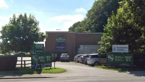 An image of a York Sports Club - a brick building, surrounded by trees.