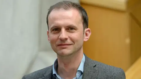 Getty Images Stephen Gethins in the Scottish parliament 