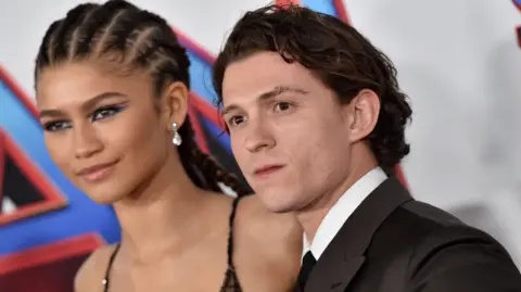 Zendaya and Tom Holland attend Sony Pictures' "Spider-Man: No Way Home" Los Angeles Premiere on December 13, 2021 in Los Angeles, California.