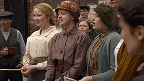 Women dressed in 1920s costumes