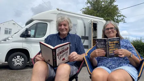 Robert and Debbie Woodhouse with their motorhome