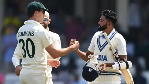 Australia captain Pat Cummins and India's Mohammad Siraj